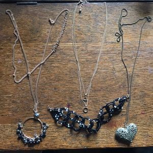 Three necklaces and a beaded bracelet